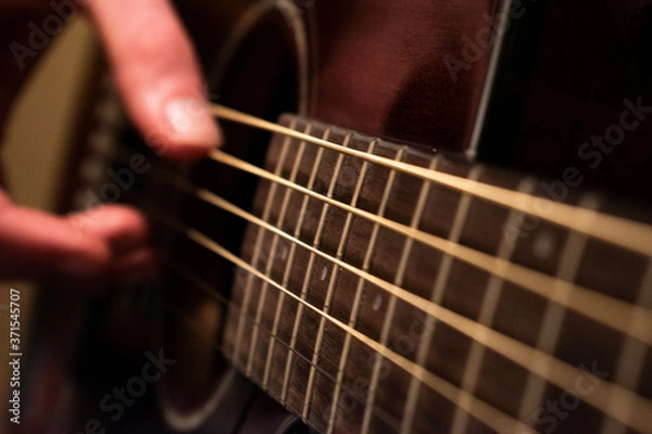 Obraz Man playing acoustic guitar
