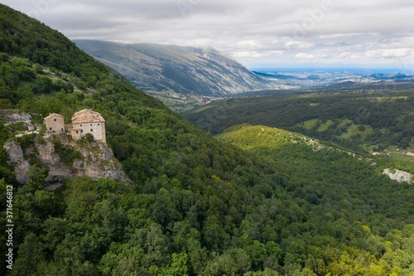 Fototapeta aerial view of the hermitage of the madonna dell'altare in the mountain area of the majella abruzzo italy