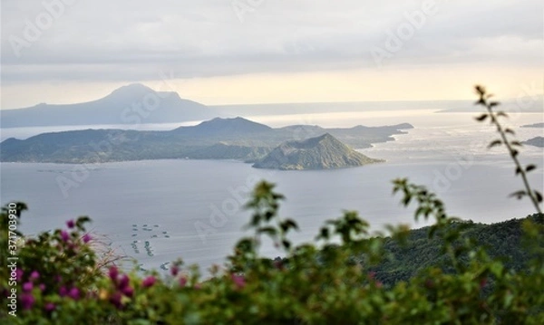 Fototapeta The famous Taal Volcano in the Philippines, sitting on an island within a lake within an island, is a popular getaway for Manila tourists
