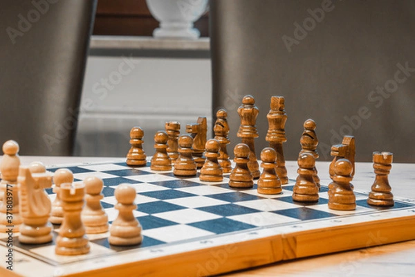 Fototapeta black and white chessboard with chessmen (game)