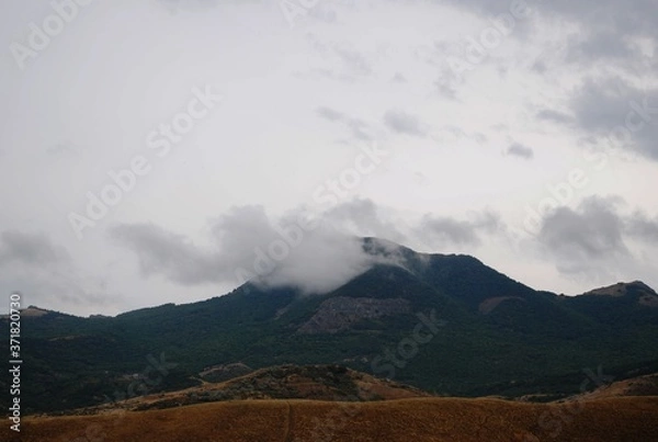 Obraz Mountain landscape with clouds
