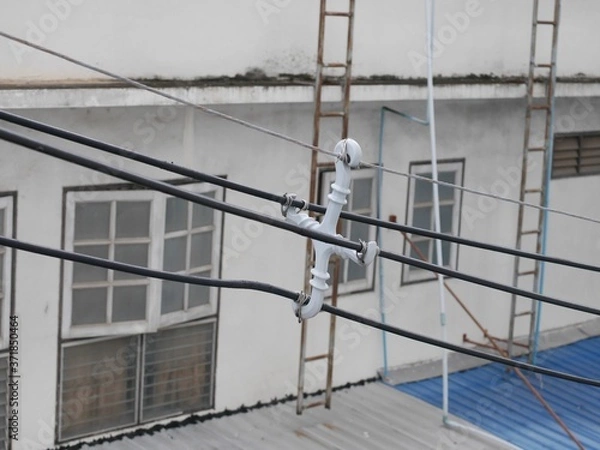 Obraz cable holder for electric high voltage.