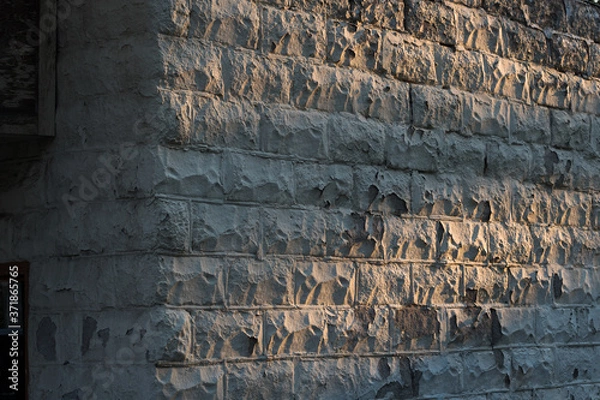 Obraz Textured Stone Wall at Sunset Background