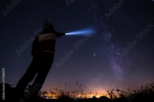 Obraz Unrecognized man looking stars