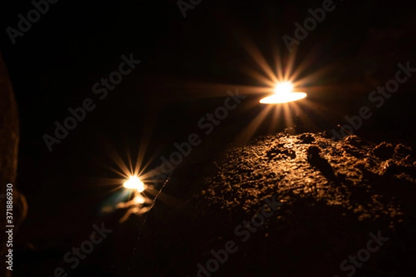 Fototapeta Candles in a tree