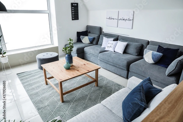 Obraz Stylish interior of living room with comfortable sofas and table