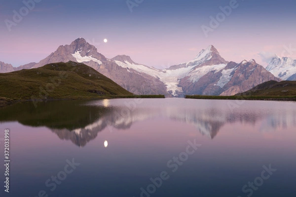 Fototapeta Sunrise view on Bernese range above Bachalpsee lake. Highest peaks Eiger, Jungfrau and Faulhorn in famous location. Switzerland alps, Grindelwald valley. Popular tourist attraction. Europe. 