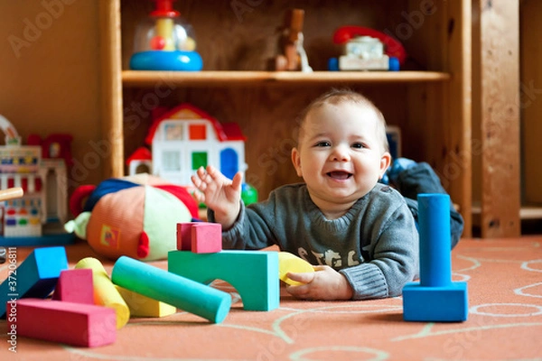 Obraz Dziecko z zabawkami