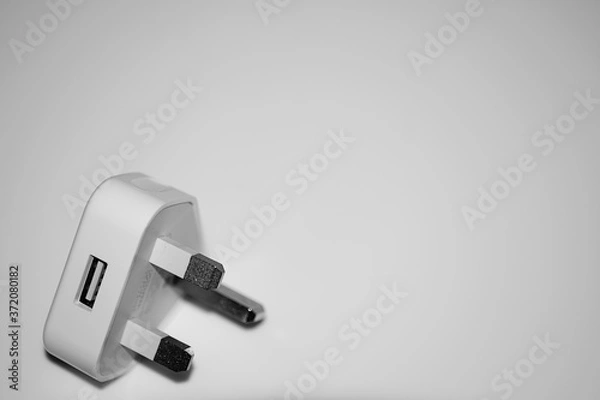 Obraz Isolated British electric plug, white background.