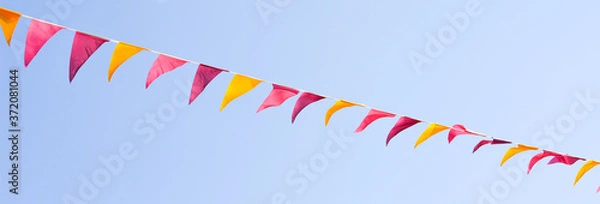 Fototapeta Party flags in the sky