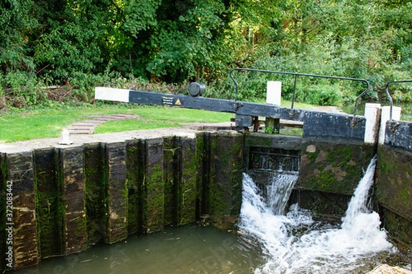 Obraz River gateway, sluice. Summer time.