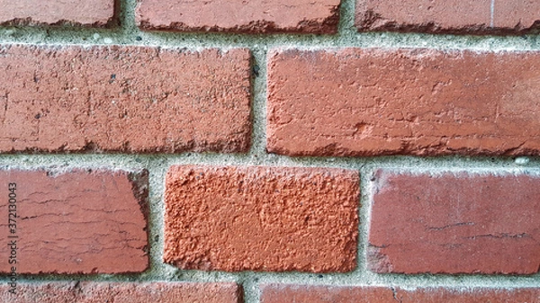 Fototapeta photo of a red brick wall close up for texture or background