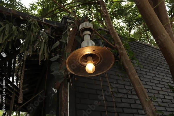 Obraz old lamp on the wall