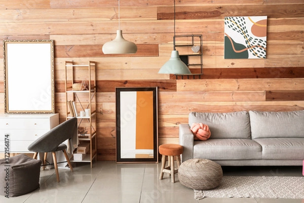 Fototapeta Stylish interior of living room with sofa and mirrors