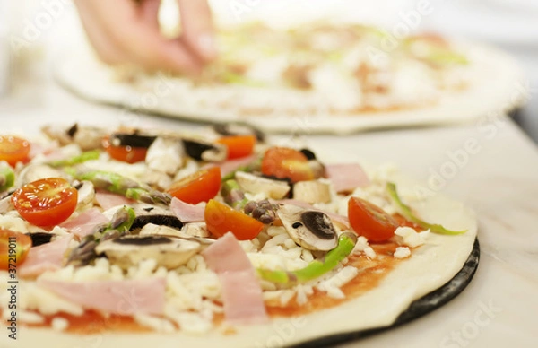 Obraz Preparing a Pizza