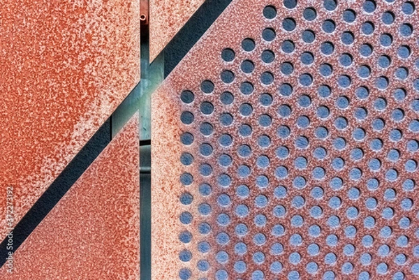 Obraz Abstract geometric background with rusty perforated metal cladding plates