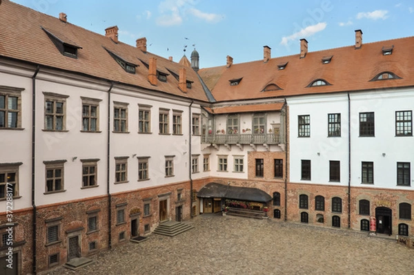 Fototapeta Mir castle and Park complex is an architectural complex, defensive fortification and residence. It is an architectural monument included in the UNESCO world heritage list. Belarus.