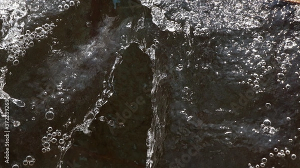 Fototapeta water flowing into the water