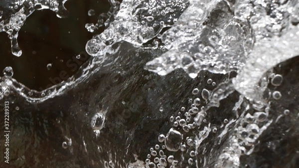 Obraz water flowing into the water