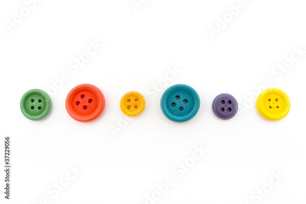 Fototapeta Line of colorful buttons over white