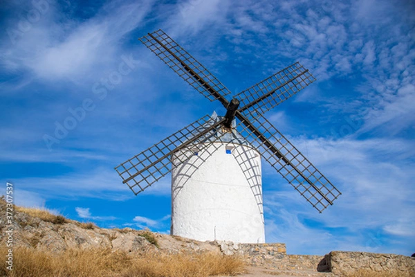 Obraz Photo of some beautiful and historic windmills located in Consuegra, Toledo, Spain during a sunny day of summer in a natural place. 