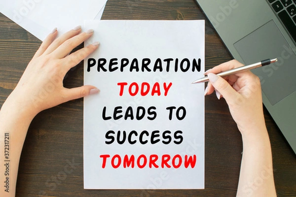 Obraz Preparation Today Leads to Success Tomorrow inscription on sheet a4, the girl writes next to the laptop