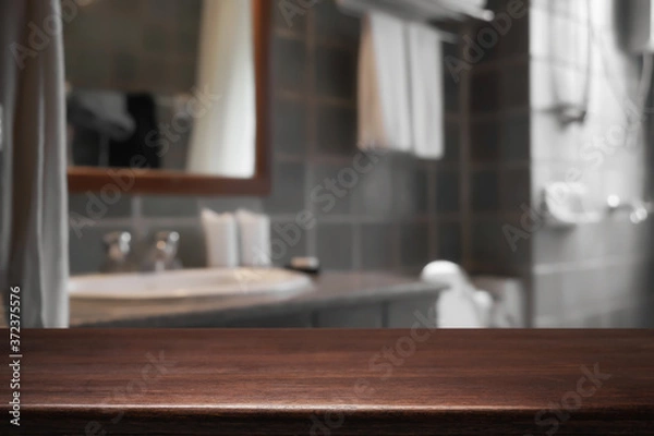 Fototapeta Empty wooden desk space hotel bathroom or toilet  background for product display montage.