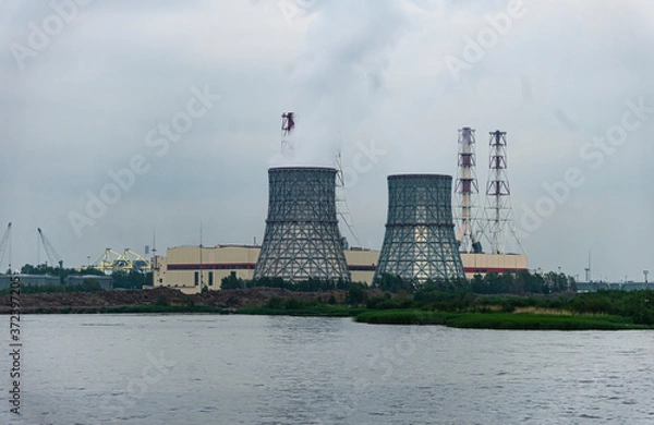 Fototapeta Thermal station on the shore of the reservoir.