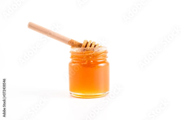 Obraz honey and honey in jar on white background