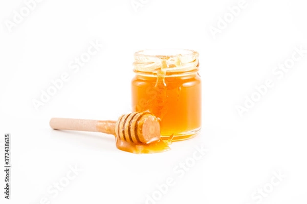 Obraz honey and honey in jar on white background