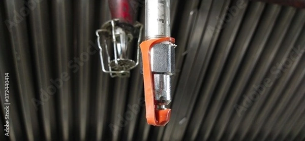 Obraz The new fire suppression system is thought to replace the old one in the kitchen