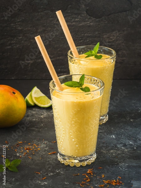 Fototapeta A typical Indian mango lassi dessert