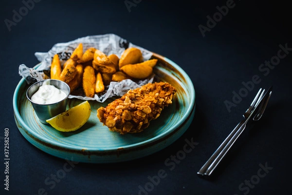 Fototapeta Fried chicken with sesame and potatoes