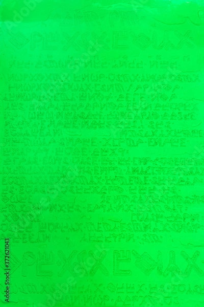 Obraz Casting of possible emerald tablet visualisation with epoxy resin to prepared form (no real meaning)