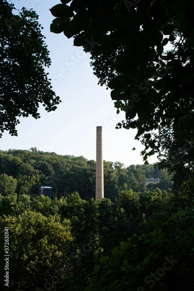 Obraz Historical Bancroft mills production industry factory smoke stack located in Wilmington Delaware at alapocas state park 