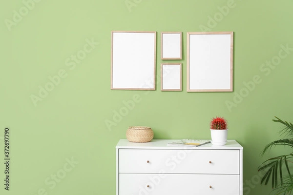 Obraz Interior of room with blank picture frames