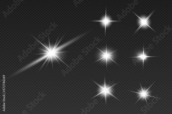 Fototapeta White sparks glitter special light effect. Vector sparkles on transparent background. Christmas abstract pattern. Sparkling magic dust particles
