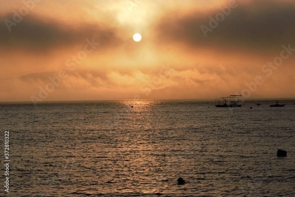 Fototapeta sunset over the sea