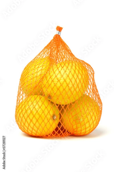 Obraz Lemons in plastic netting