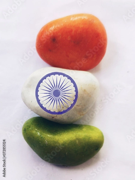 Fototapeta Concept of Indian flag with colurful stones on white background