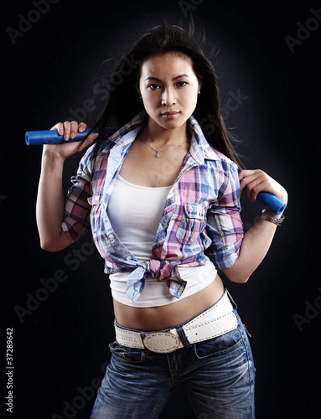 Obraz Mädchen mit Nunchaku