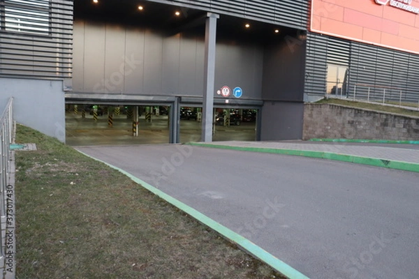 Fototapeta parking exit road with symbols and signs