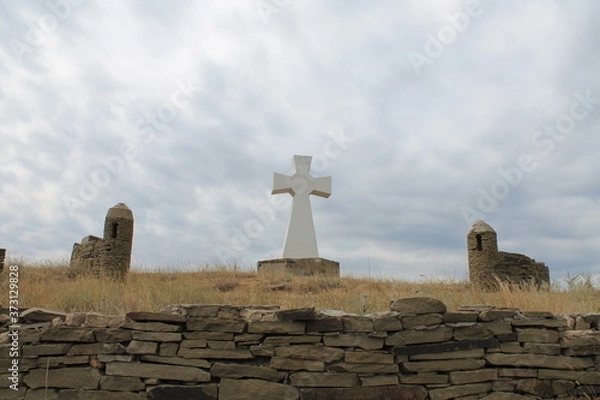 Obraz The memorial stone cross in the steppe