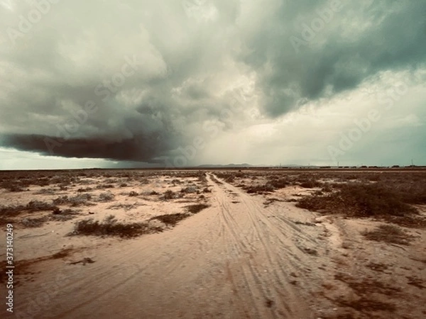 Obraz storm clouds over the desert