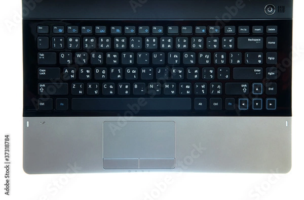 Fototapeta Keyboard of modern notebook on isolate backgrond.