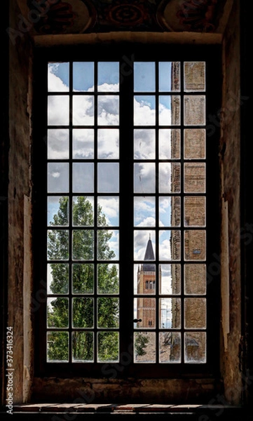 Fototapeta Parma, Emilia Romagna, Italy, view of the bell tower from an ancient palace window, Unesco world heritage site