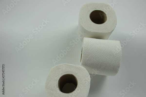 Fototapeta roll of toilet paper on white background