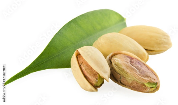 Obraz Pistachios and a green leaf