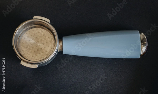 Fototapeta Coffee holder on black background