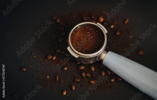 Fototapeta Coffee machine holder with ground beans